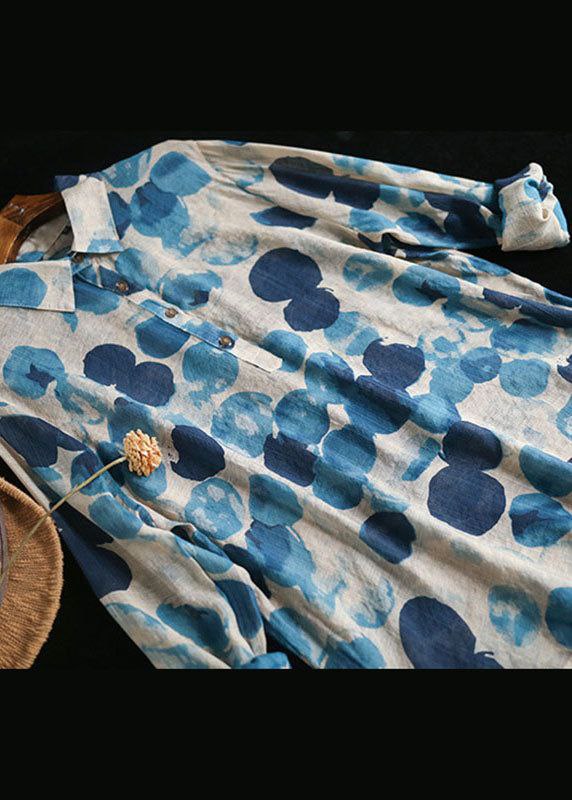 Blue and white floral patterned shirt on a dark background