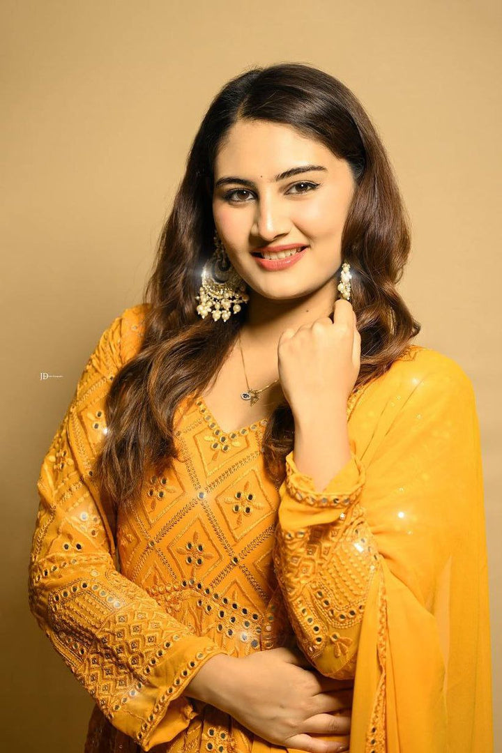 Elegant mirror work ethnic outfit in bright mustard color