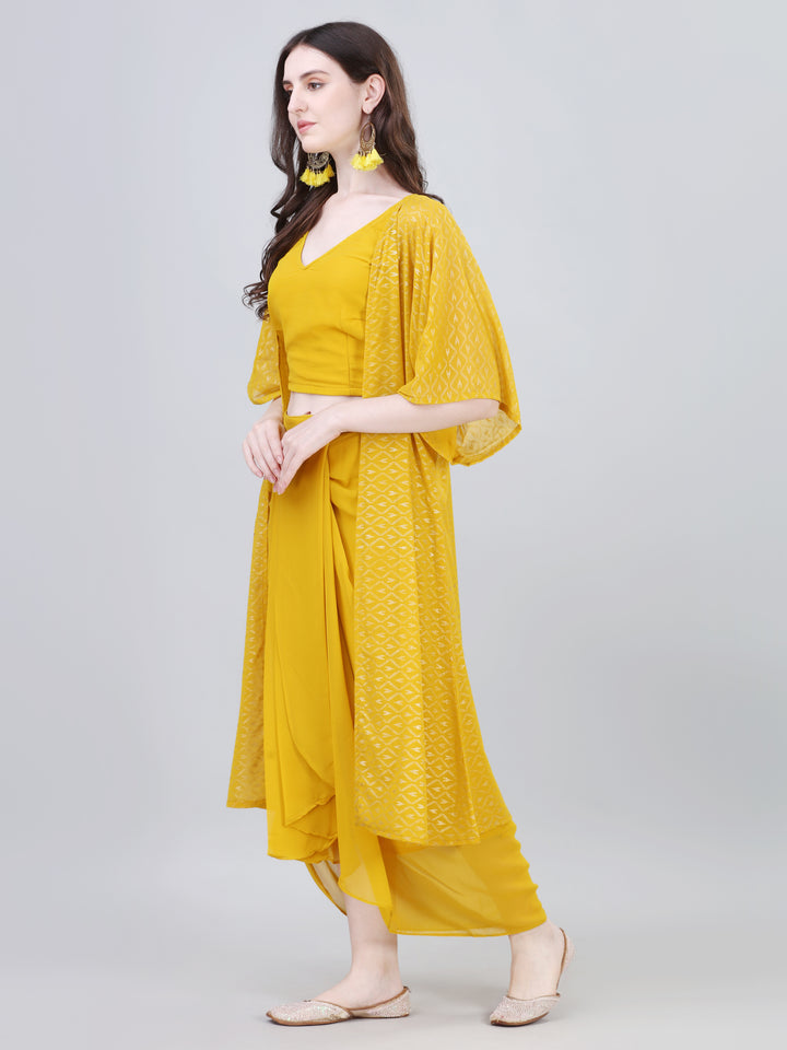 Side view of mustard yellow draped skirt co-ord set with sleeveless crop top and printed shrug – Modestouze Attires