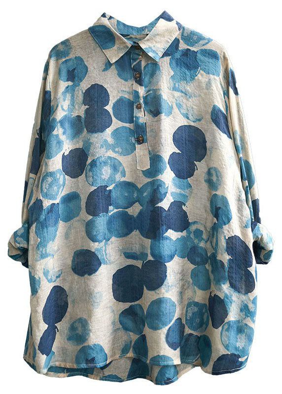 Blue floral patterned shirt on a white background