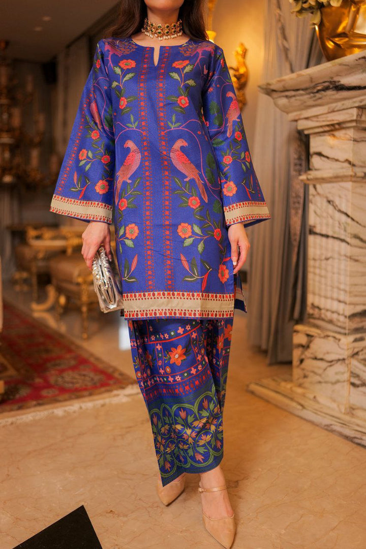 Vibrant blue ethnic outfit styled with golden accessories