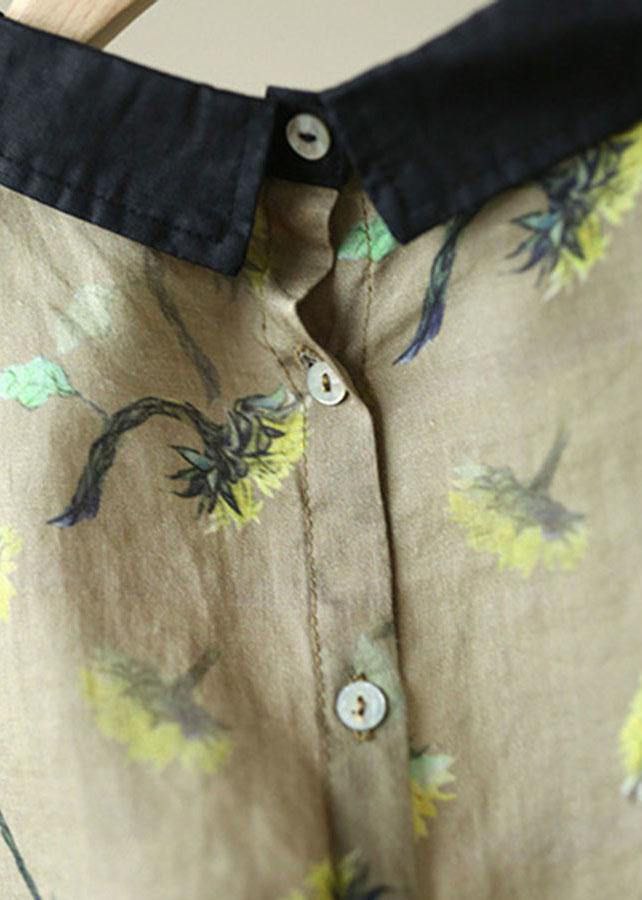 Close-up of a shirt with floral patterns and buttons.