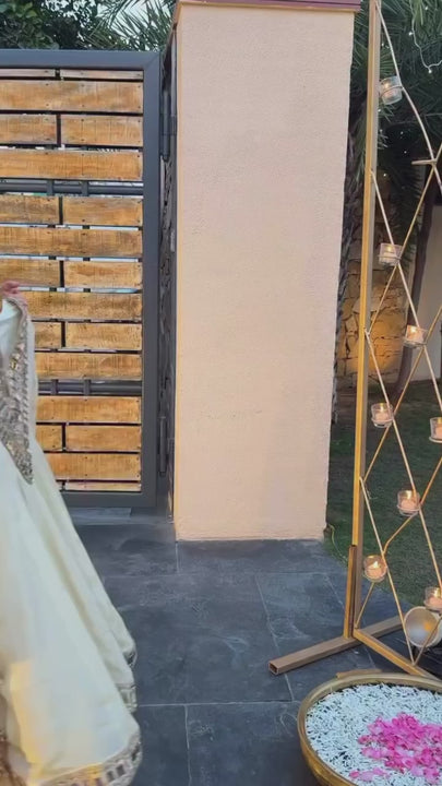 Beautiful ivory sharara set with mirror work details